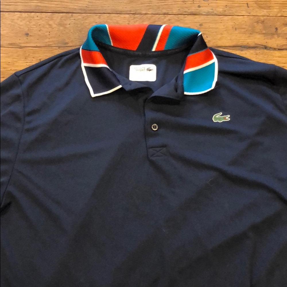 Lacoste dark blue sport polo.